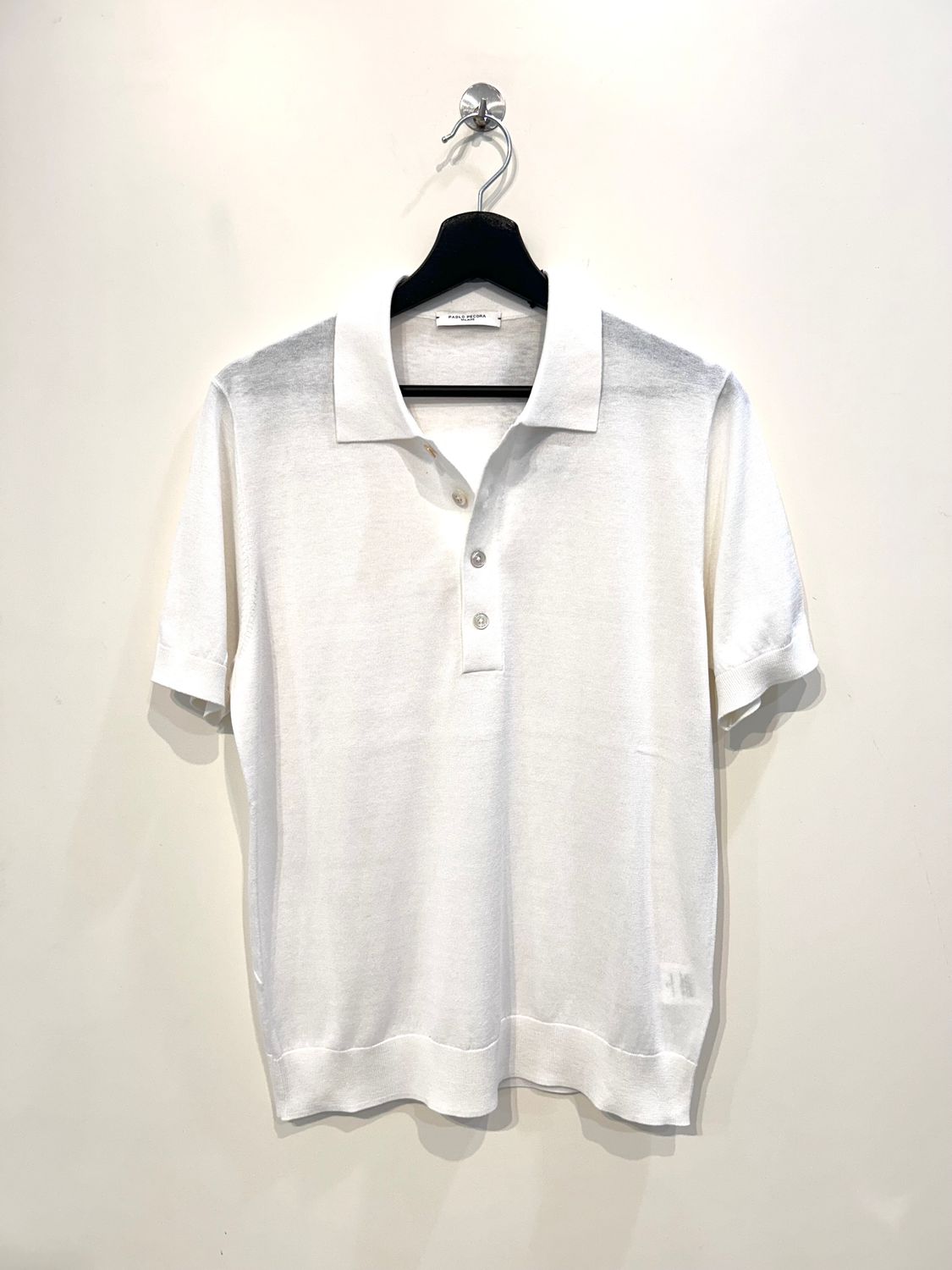 Polo in maglia calata in seta e cotone. Col. Latte