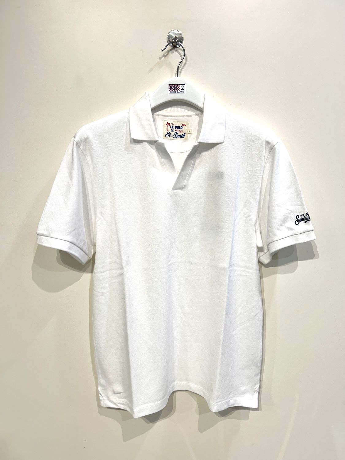 Polo derby in piquet di cotone leggero. Col. Bianco