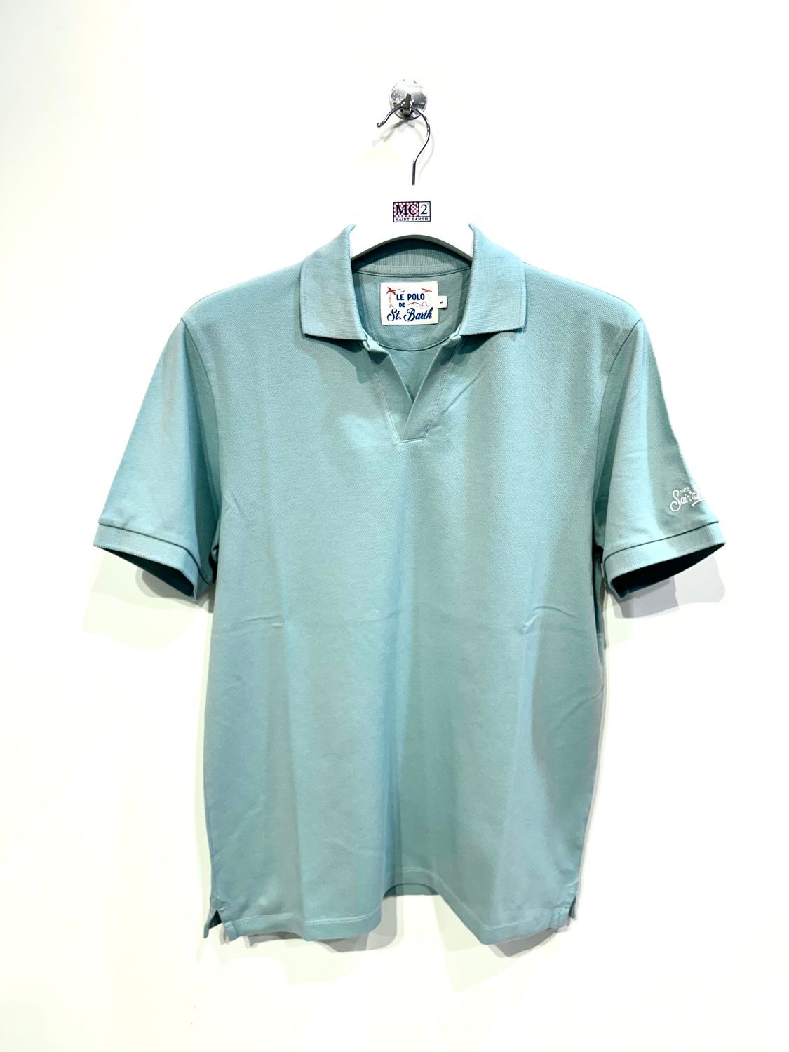 Polo derby in piquet di cotone leggero. Col. Acqua