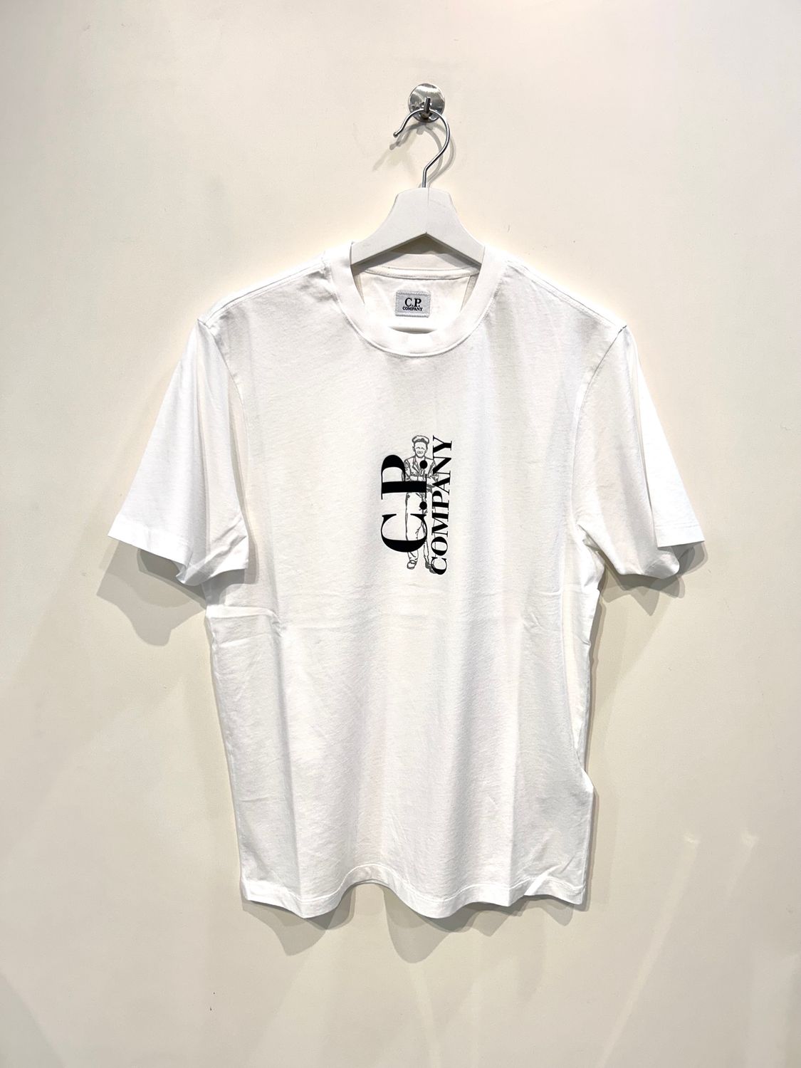 Tshirt in cotone stampa frontale verticale. Col. Bianco