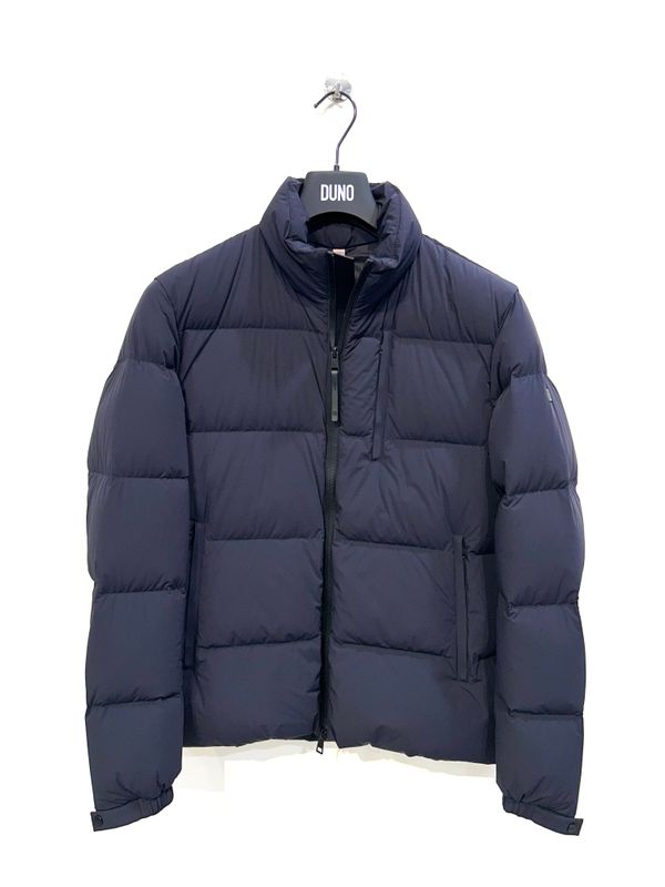 Piumino corto packable in tessuto tecnico bi strech. Col. Blu Navy