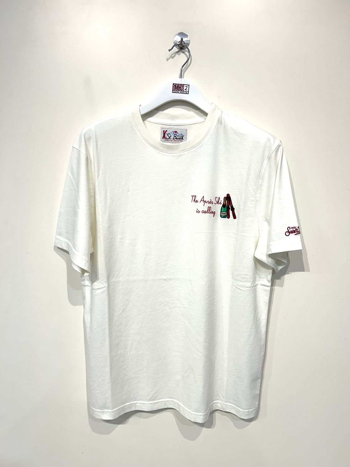 T-shirt manica corta in cotone organico con ricami. Col. Latte
