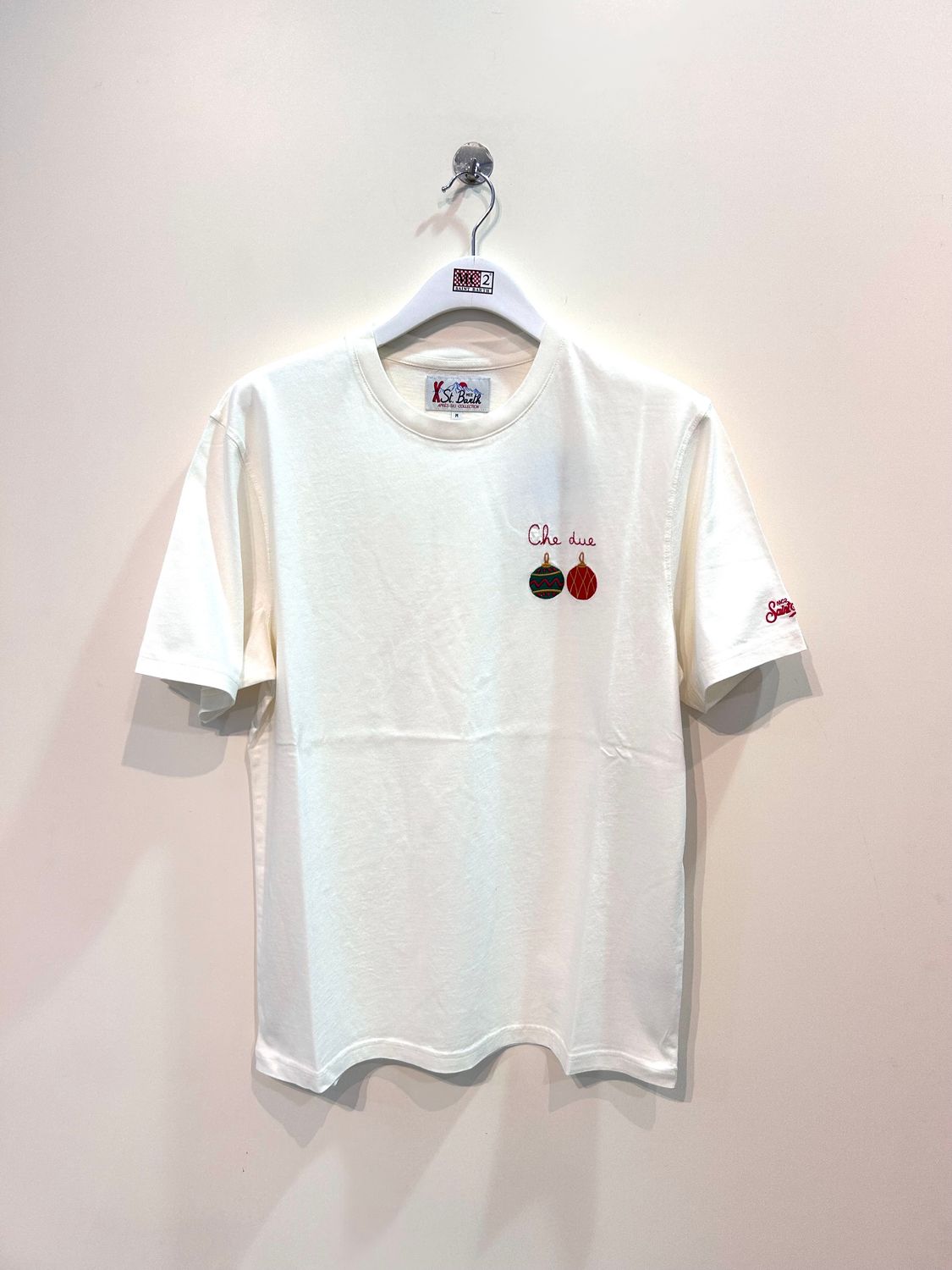 T-shirt manica corta in cotone organico con ricami. Col. Latte