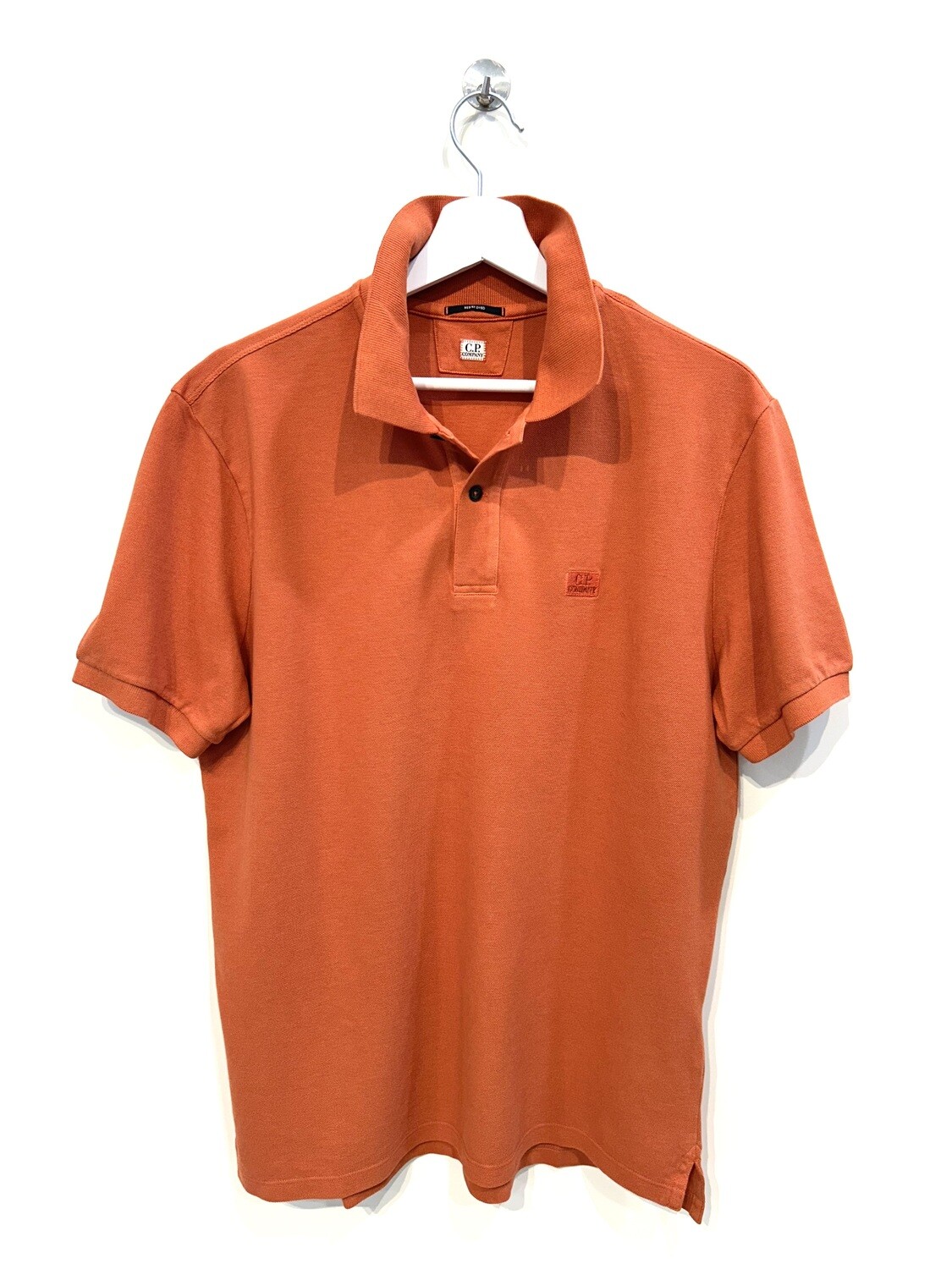 Polo manica corta in piquet di cotone tintura resist dyed. Col. Arancio