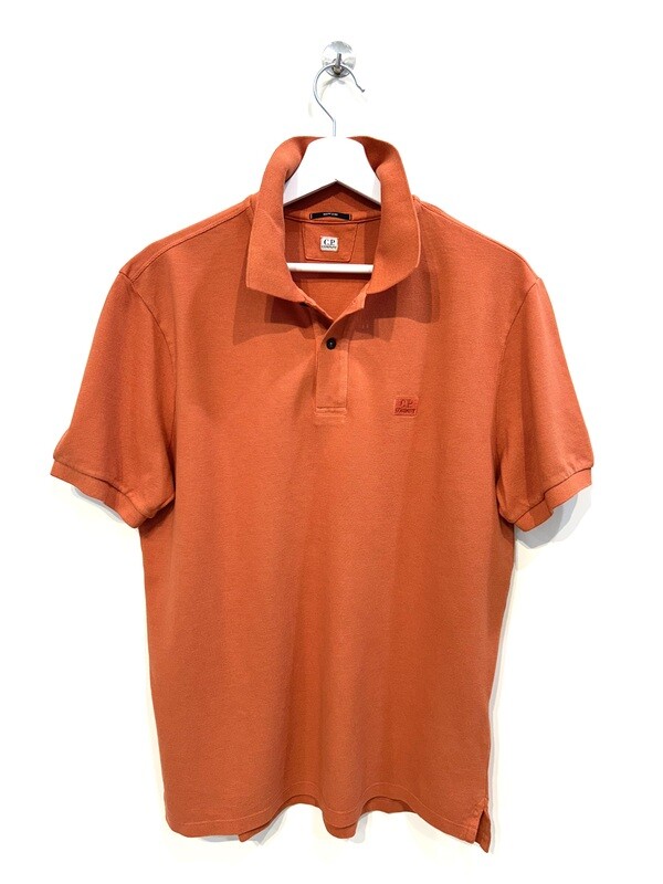 Polo manica corta in piquet di cotone tintura resist dyed. Col. Arancio