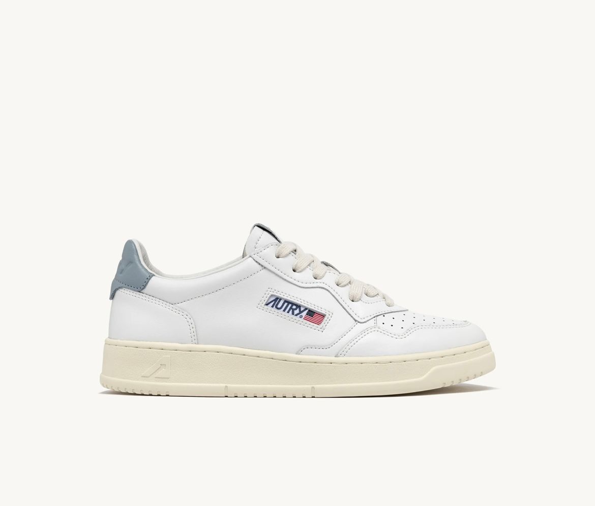 Sneaker Autry realizzata in pelle, talloncino logato in contrasto . Col. Bianco - Polvere