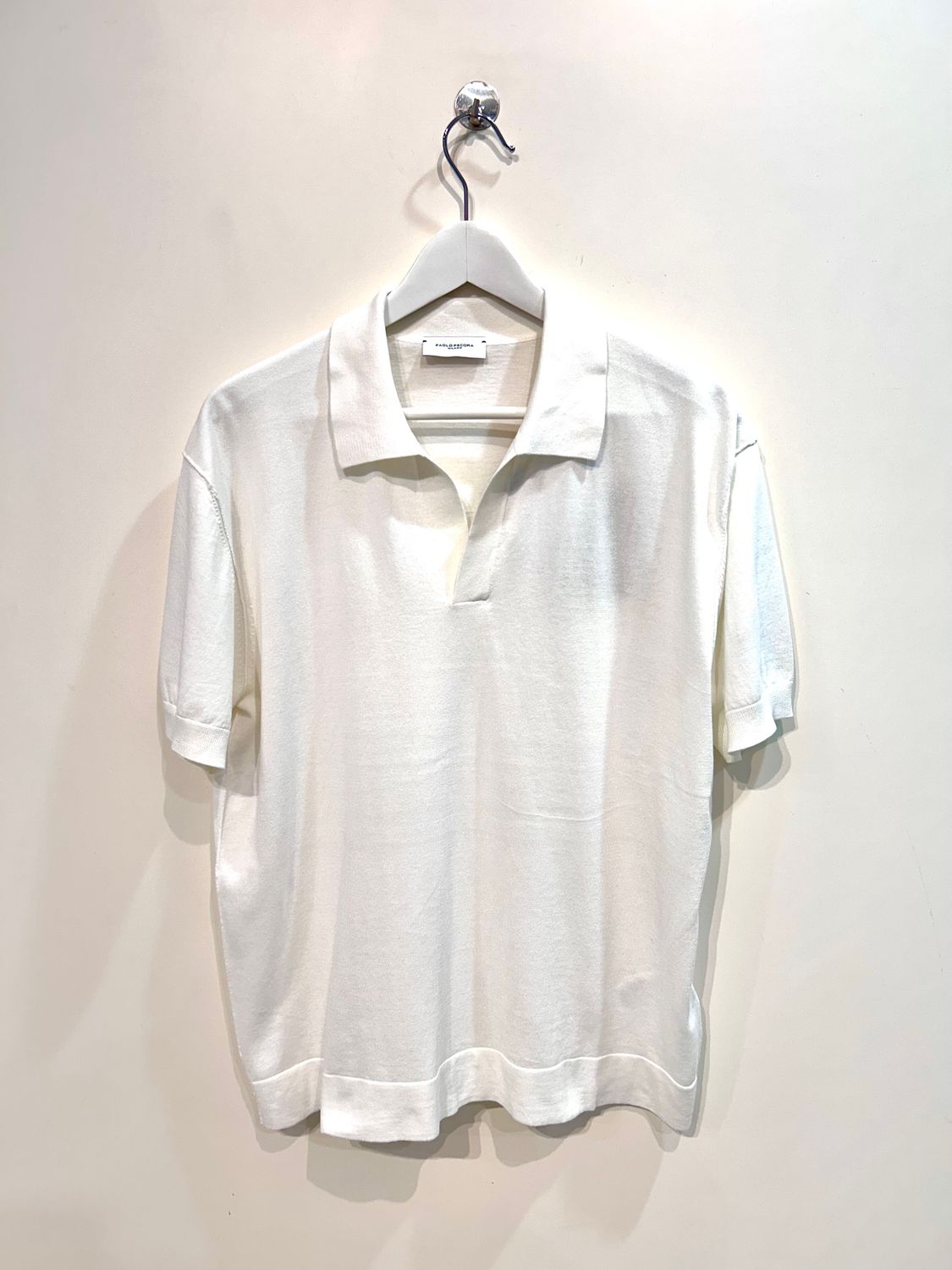 Polo derby in maglia di cotone rasata. Col latte