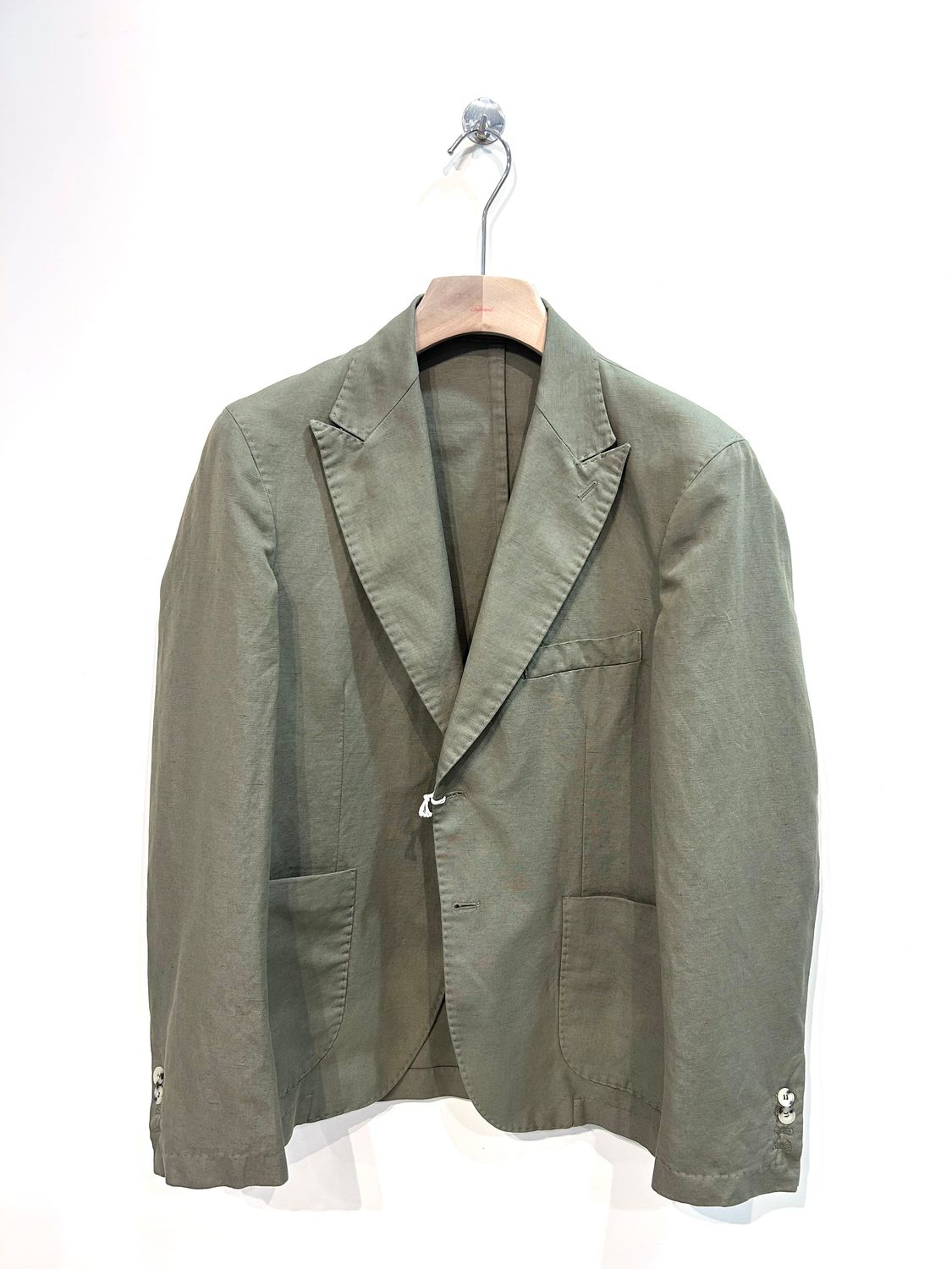 Giacca in cotone e lino rever punta a lancia. Col. Verde militare