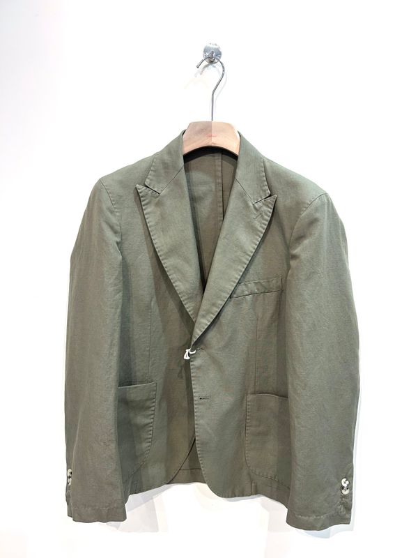 Giacca in cotone e lino rever punta a lancia. Col. Verde militare