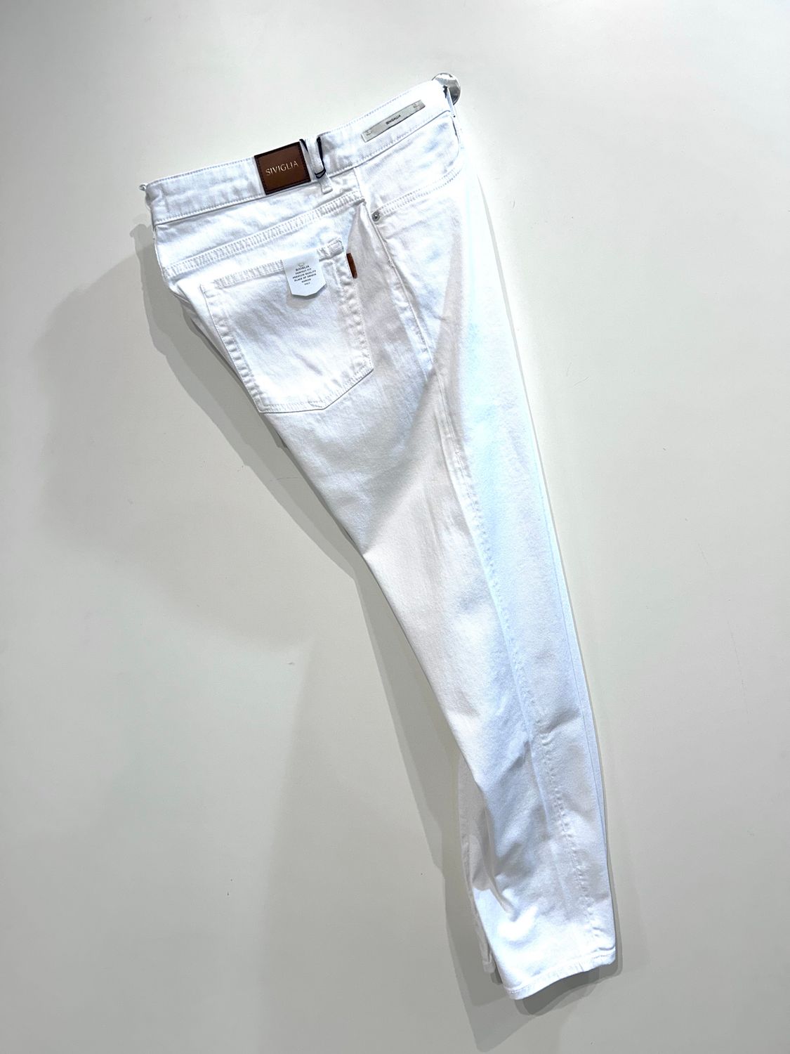 Jeans bull di cotone elasticizzato. Col. Bianco ottico