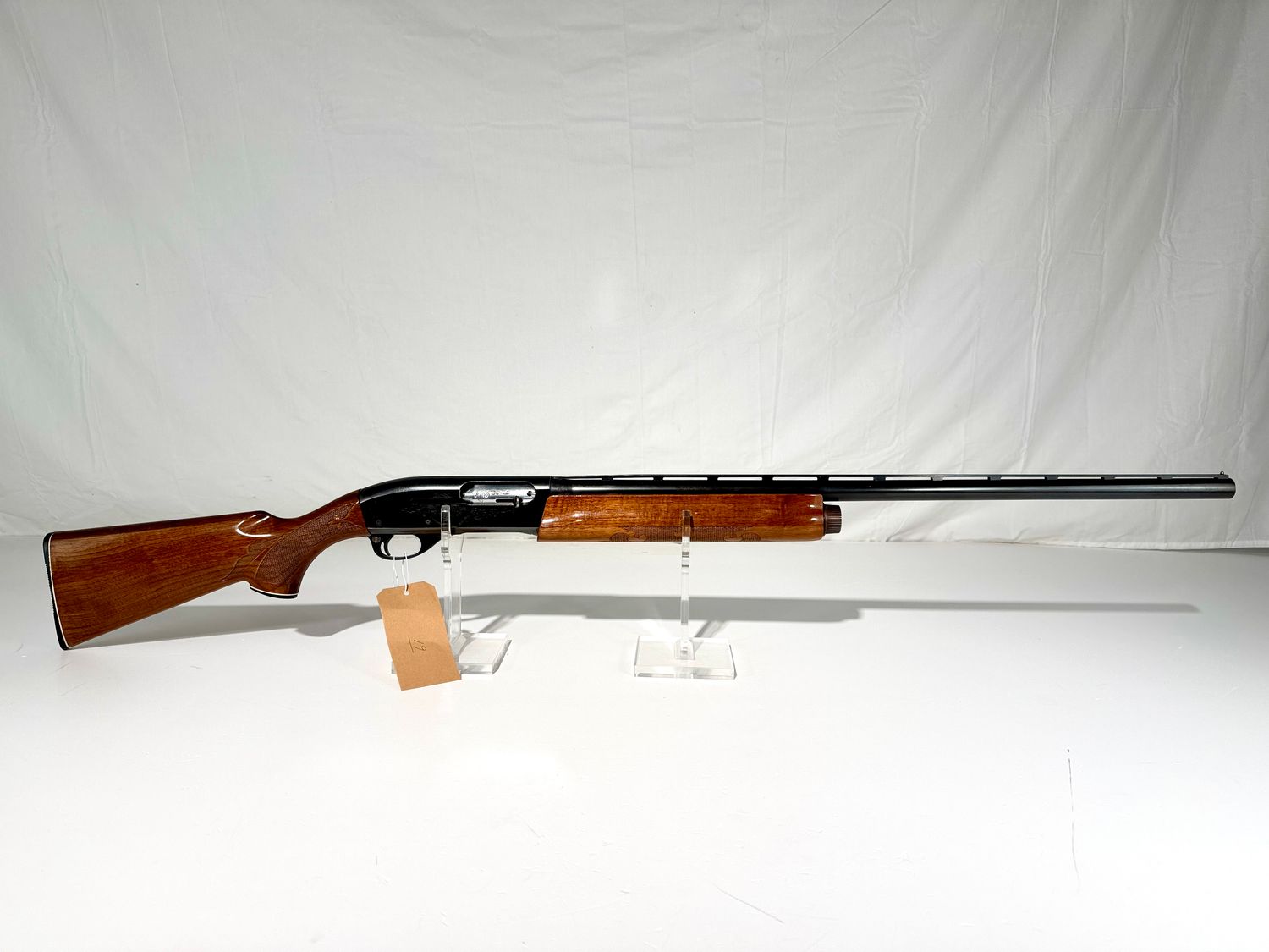 19 REMINGTON 1100 12 GA SEMI AUTO SHOTGUN