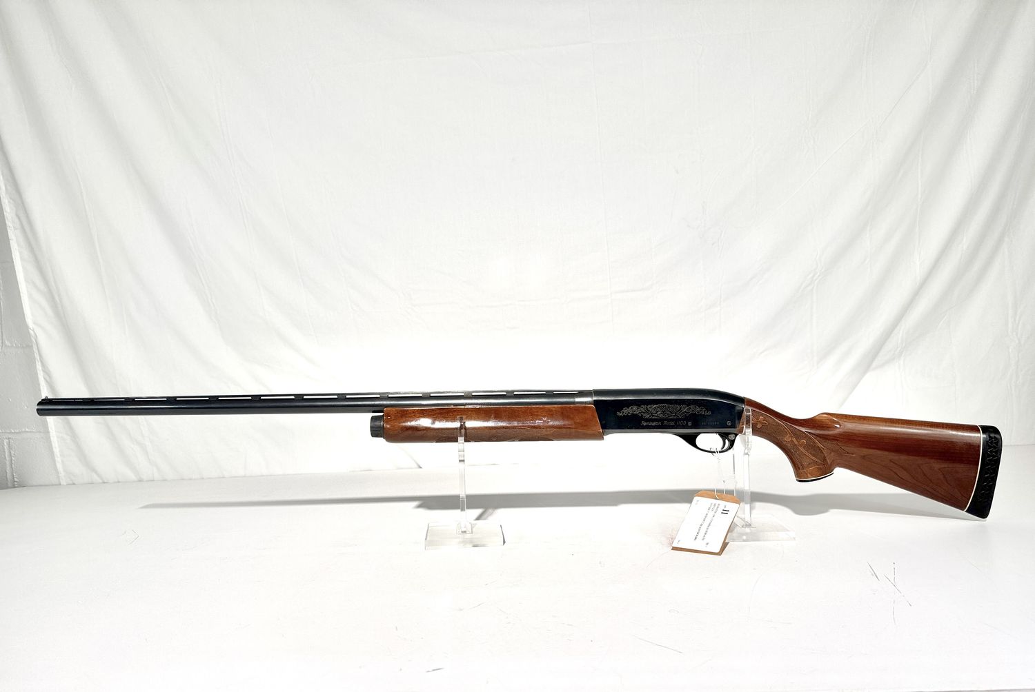 11 REMINGTON 1100 12 GA MAGNUM SEMI AUTO SHOTGUN