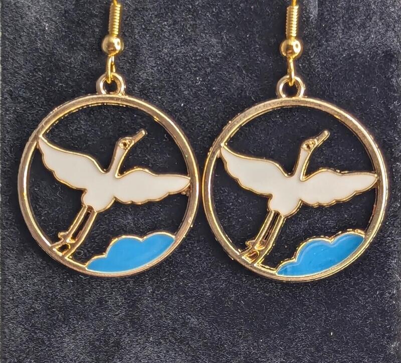 Flying Cranes over Water