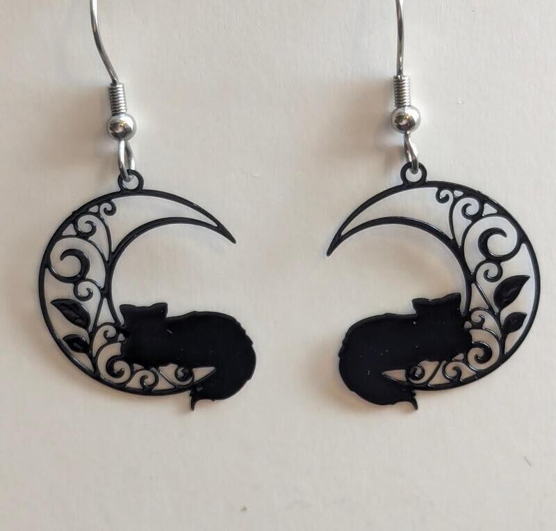 Black Cats on a Filigreed Moon