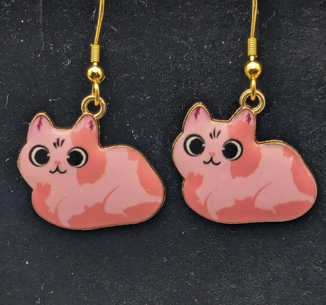 Pink Sitting Cats