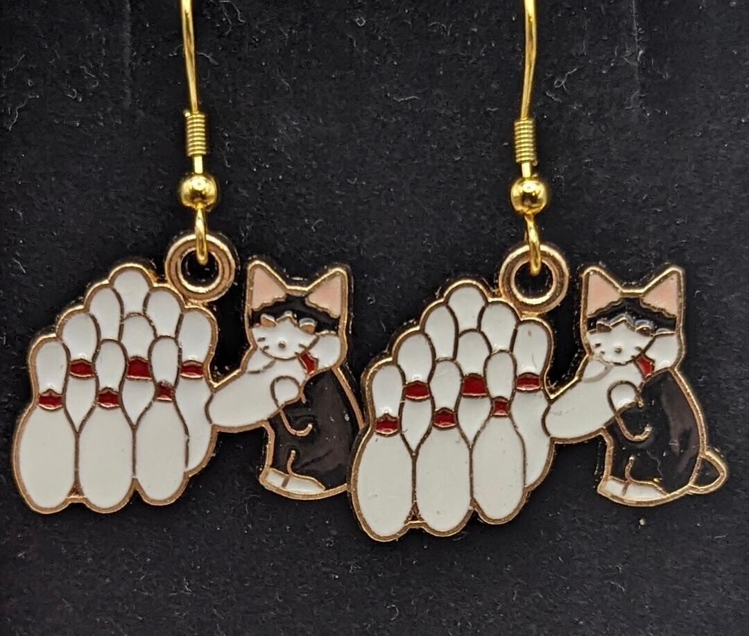 Cats with Bowling Pins