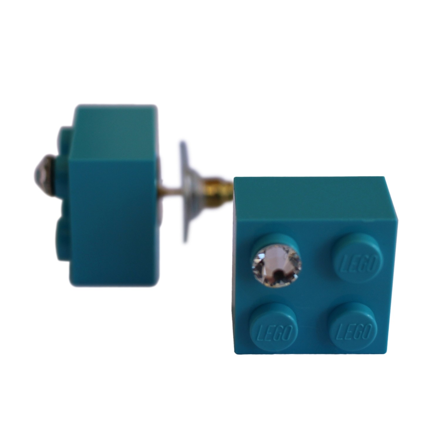 Turquoise Blue LEGO® brick 2x2 with a ‘Diamond’ color SWAROVSKI® crystal on a Gold plated stud/silicone back stopper
