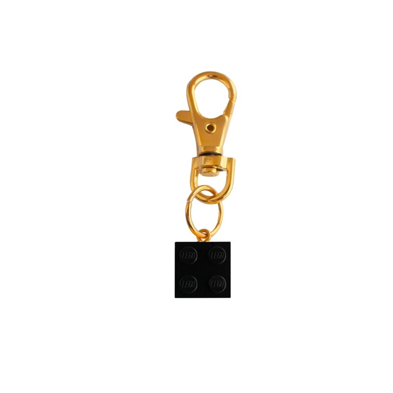 ​Black LEGO® brick 2x2 on a Gold keyring (keychain)