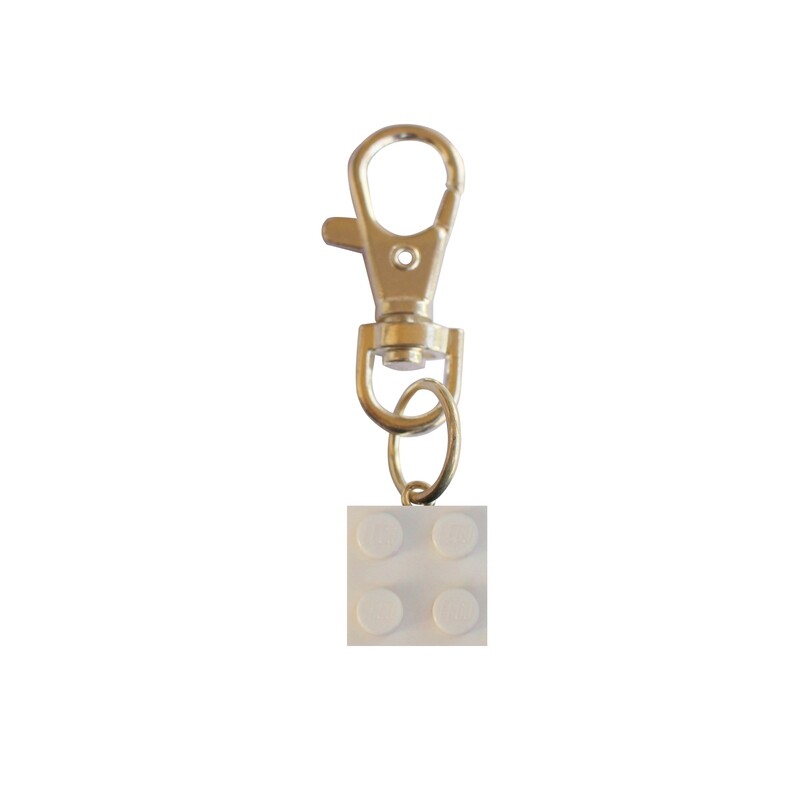 White LEGO® brick 2x2 on a Silver keyring (keychain)
