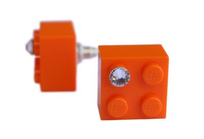 Orange LEGO® brick 2x2 with a ‘Diamond’ color SWAROVSKI® crystal on a Silver plated stud/silicone back stopper