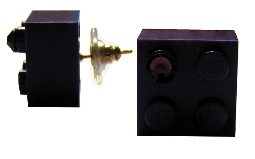 Purple LEGO® brick 2x2 with a Purple SWAROVSKI® crystal on a Gold plated stud/silicone back stopper