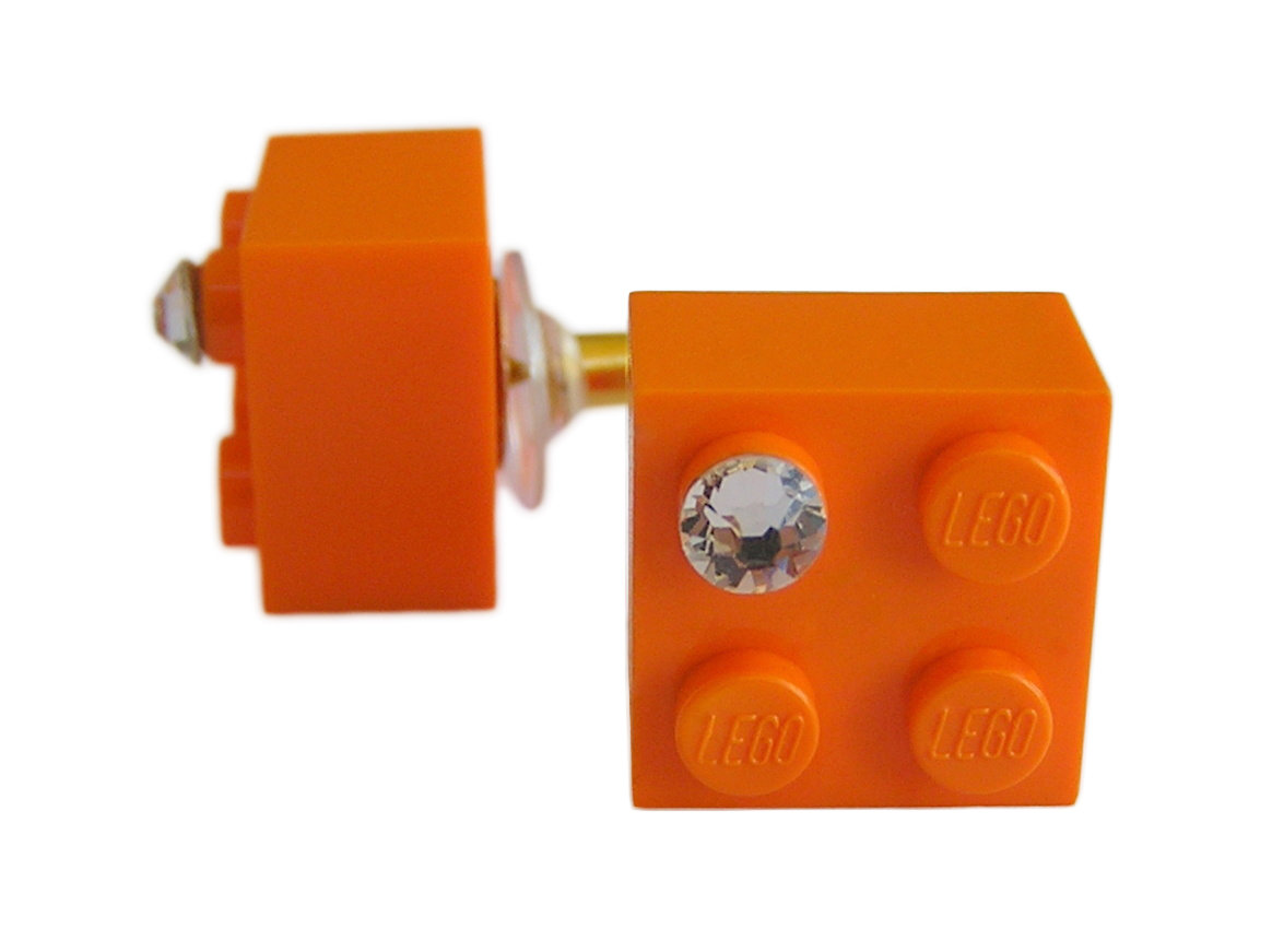 Orange LEGO® brick 2x2 with a ‘Diamond’ color SWAROVSKI® crystal on a Gold plated stud/silicone back stopper