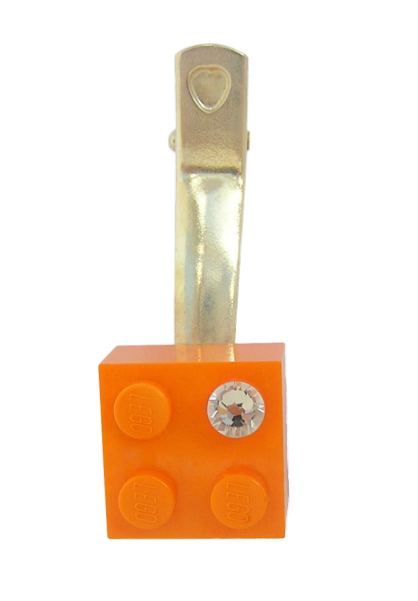 ​Orange LEGO® brick 2x2 with a ‘Diamond’ color SWAROVSKI® crystal on a Silver plated hair clip (one piece)​
