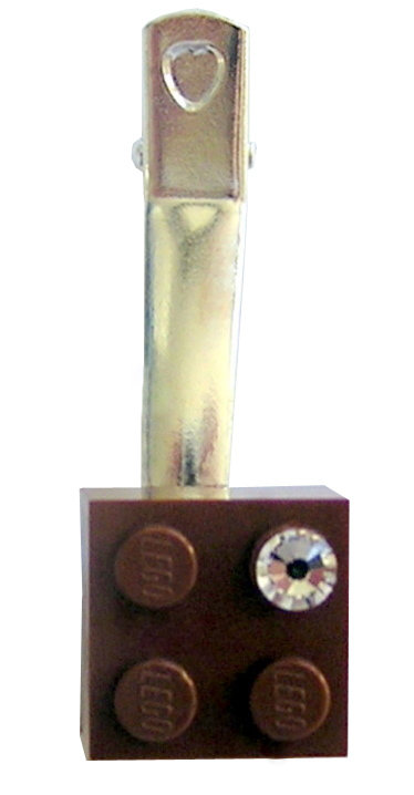 ​Brown LEGO® brick 2x2 with a ‘Diamond’ color SWAROVSKI® crystal on a Silver plated hair clip (one piece)​