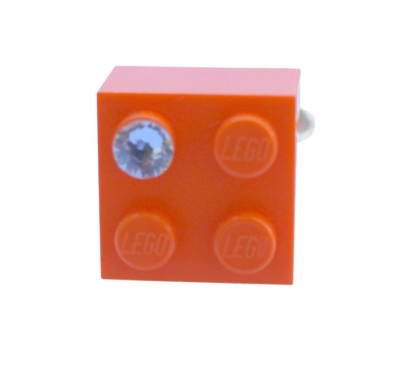 ​Orange LEGO® brick 2x2 with a ‘Diamond’ color SWAROVSKI® crystal on a Silver plated adjustable ring finding ​