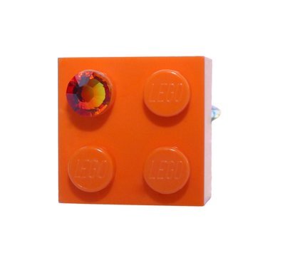 ​Orange LEGO® brick 2x2 with an Orange SWAROVSKI® crystal on a Silver plated adjustable ring ​finding