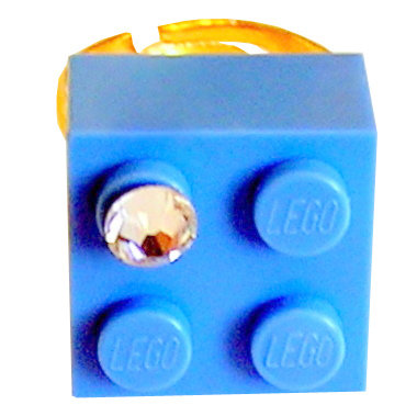 ​Light Blue LEGO® brick 2x2 with a ‘Diamond’ color SWAROVSKI® crystal on a Gold plated adjustable ring finding