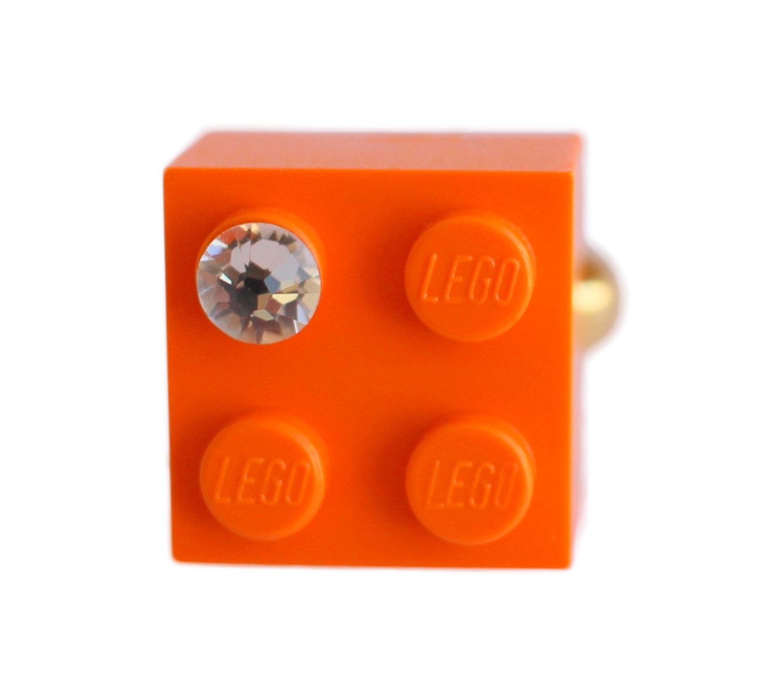 ​Orange LEGO® brick 2x2 with a ‘Diamond’ color SWAROVSKI® crystal on a Gold plated adjustable ring finding