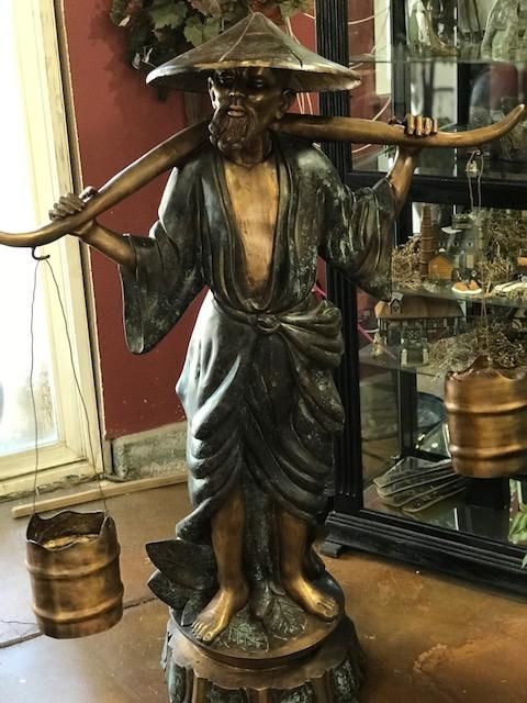 Bronze - Oriental man carrying water container
