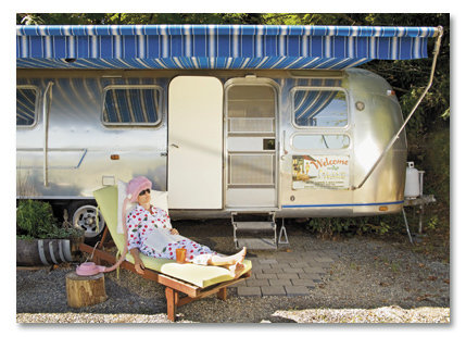 Woman in front of motor home