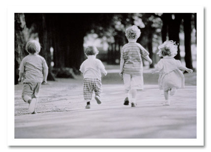 Kids running down road