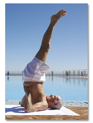 Man stretching by pool