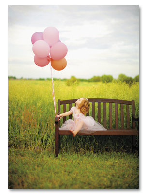 Little girl with balloons