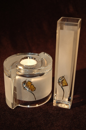 Set of 2 frosted glass vase and glass candle holder decorated with silver and amber flower motif.