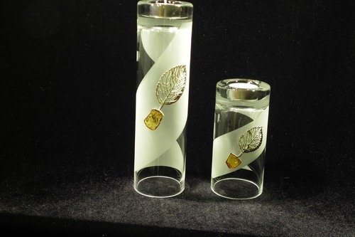 Set of 2 frosted glass vases and candle holders decorated with silver and amber tree motif.