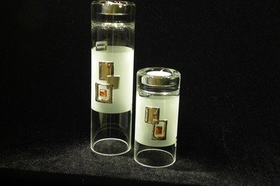 Set of 2 frosted glass vases and candle holders decorated with silver and amber square motif.