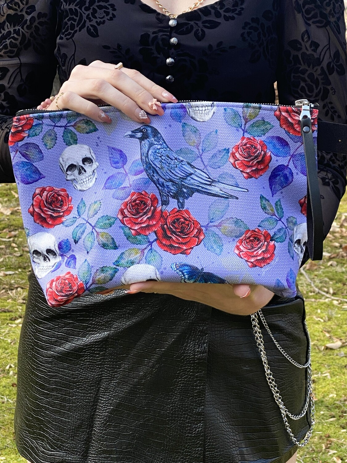 Goth Glam illustrated Make up bag featuring a raven, roses and watercolored leaves on a purple background