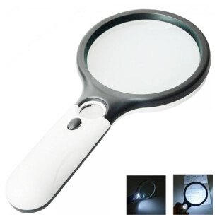 Hand held LED magnifier