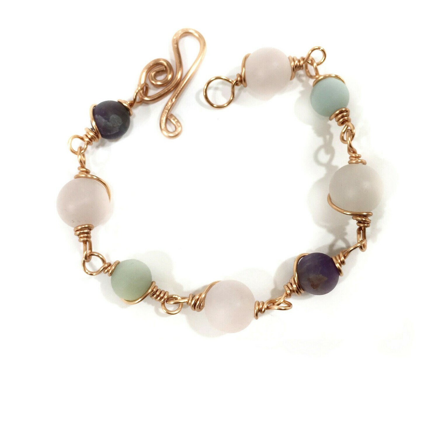 Copper bracelet with Rose Quartz, Amazonite and Amethyst frosted beads Copper bracelet with Rose Quartz, Amazonite and Amethyst frosted beads