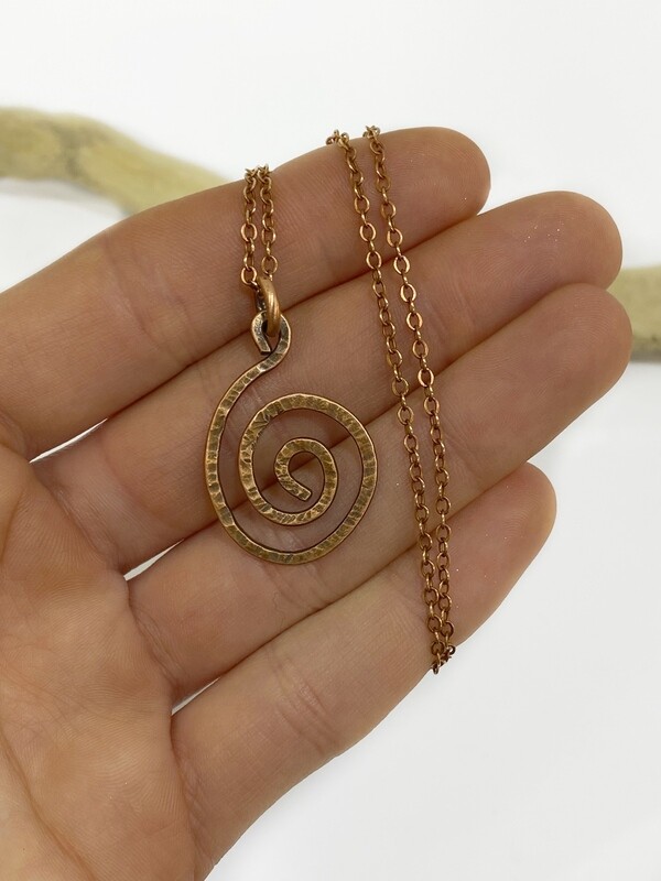 Pretty spiral pendant in tarnished copper