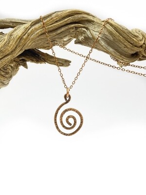 Pretty spiral pendant in tarnished copper