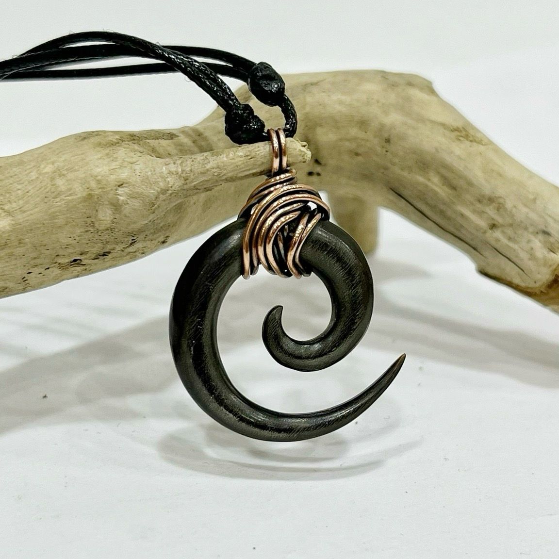 Hand Carved Horn Spiral Unisex Pendant In Copper