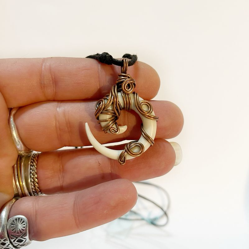 Hand Carved Bone Pendant