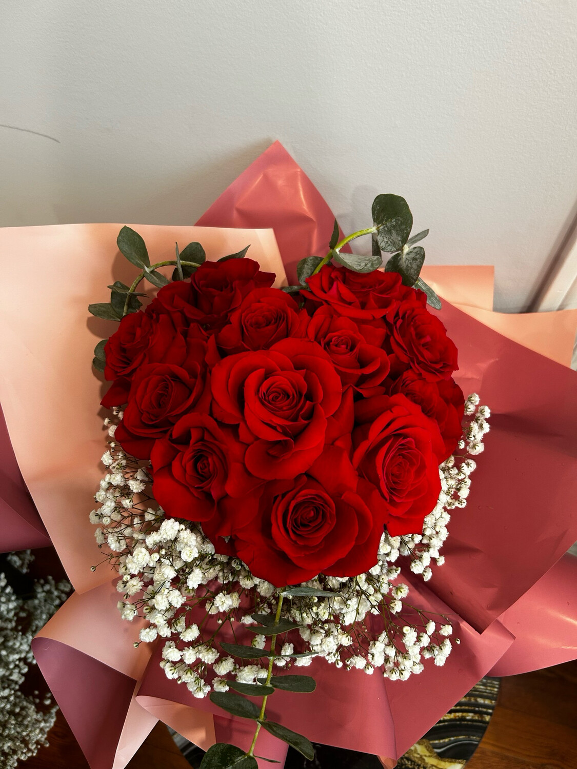 "Passionate Petals: Heart-Shaped Red Roses"