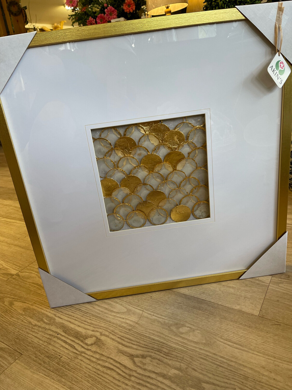 Shell shadow box with gold frame