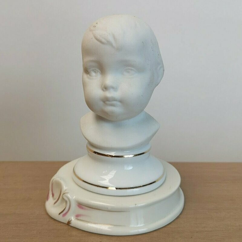 Cabeza de Niño en Peana